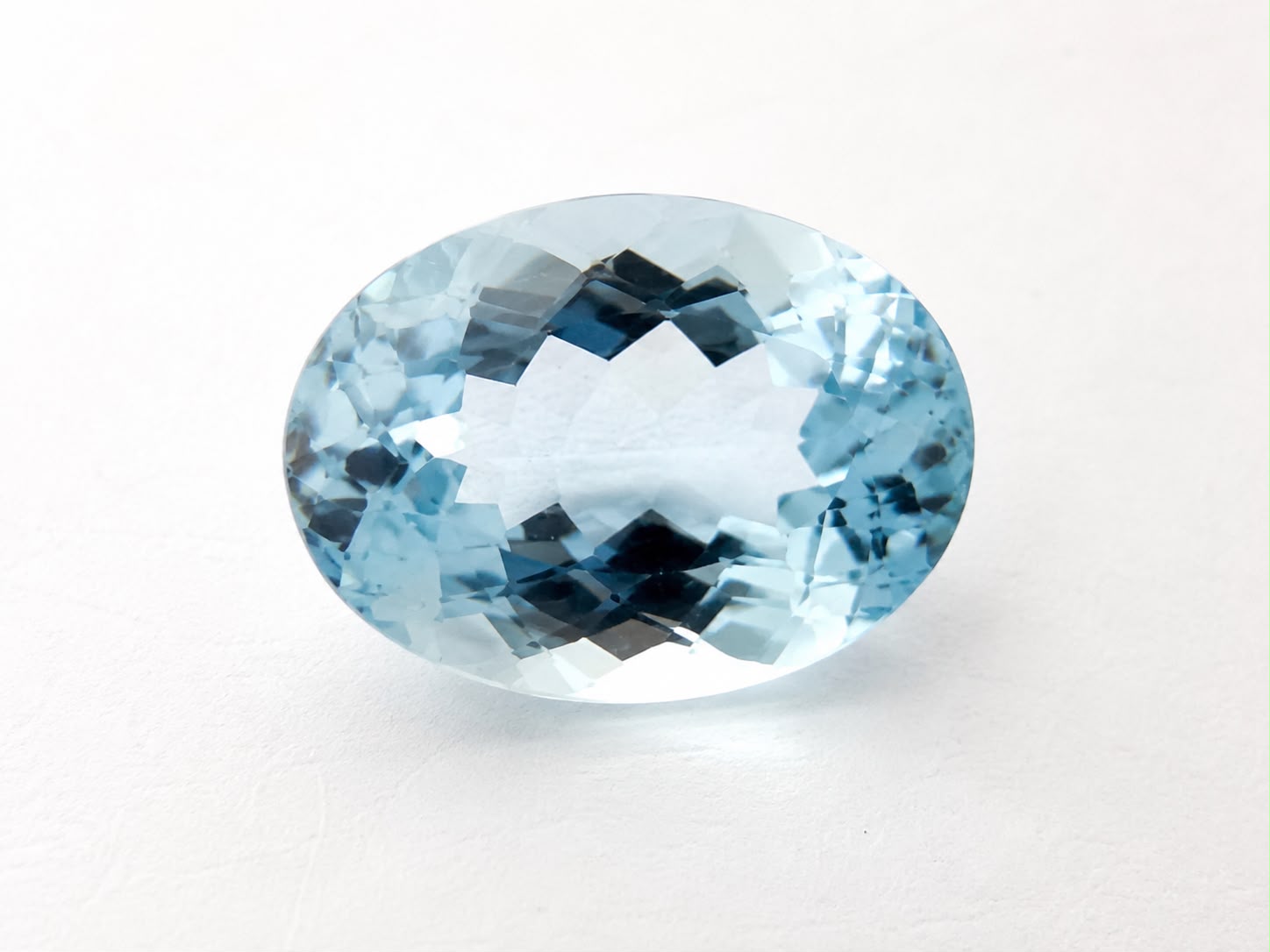 Oval-cut aquamarine